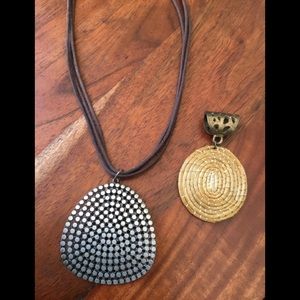 Necklace with extra pendant